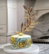 μπομπονιέρα πέτρα λουλούδι με κλαδί ελιάς τιμή 2.40€